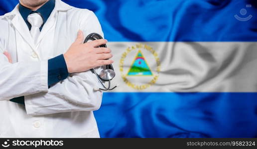 Doctor with stethoscope on flag of Nicaragua. Health and care concept with Nicaragua flag. Doctor with crossed arms on flag of Nicaragua