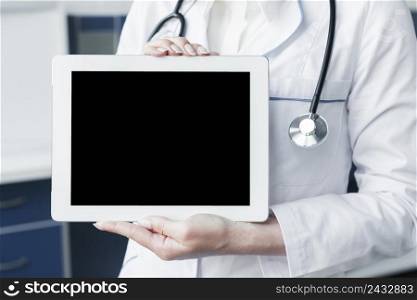 doctor with stethoscope tablet