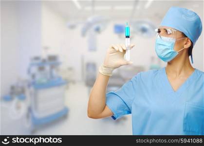 Doctor with syringe at medical office