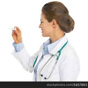 Doctor woman checking thermometer