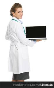 Doctor woman showing laptop blank screen