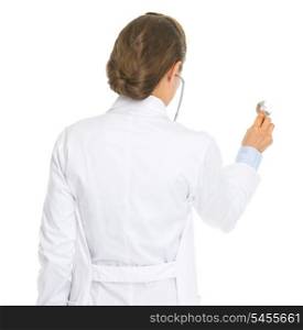 Doctor woman using stethoscope . rear view