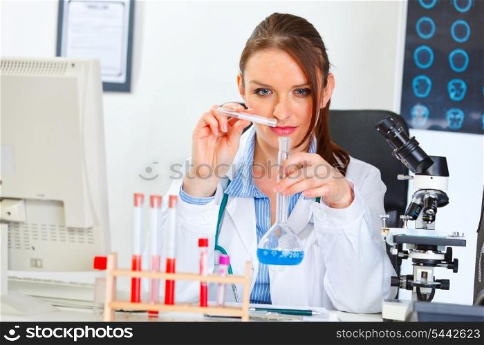 Doctor woman working with test tube in laboratory&#xA;