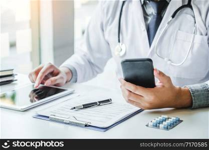 Doctor working in Hospital office and thinking about Disease problem of patient