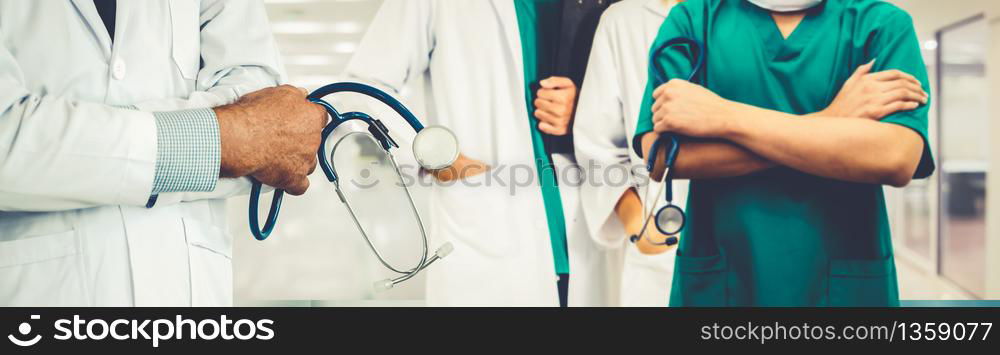 Doctor working in hospital to fight 2019 coronavirus disease or COVID-19. Professional healthcare people with other doctors, nurse and surgeon. Corona virus medical care and protection concept.