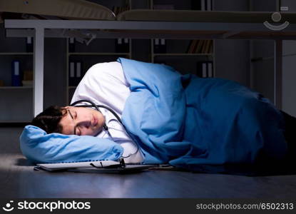 Doctor working night shift in hospital after long hours