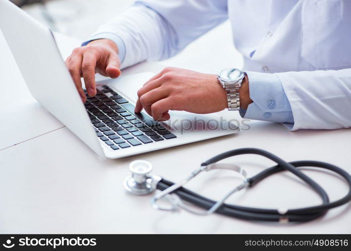 Doctor working on the computer