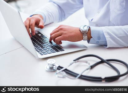 Doctor working on the computer