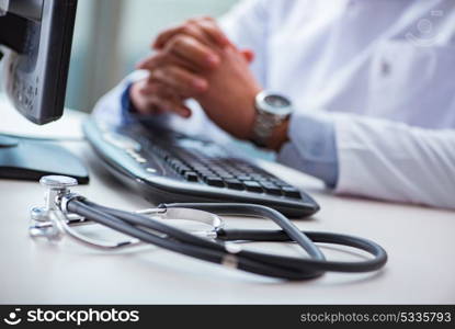 Doctor working on the computer