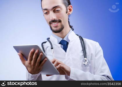 Doctor working on the tablet