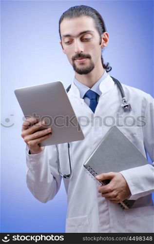 Doctor working on the tablet