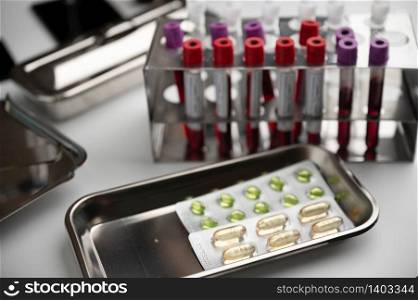 doctor working with blood sample in laboratory