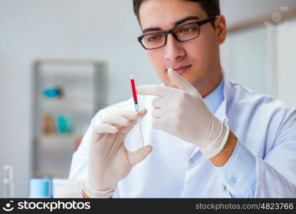 Doctor working with blood samples