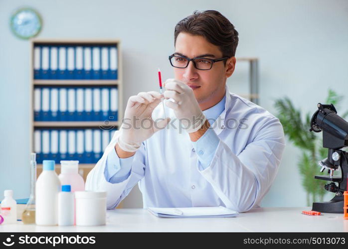 Doctor working with blood samples