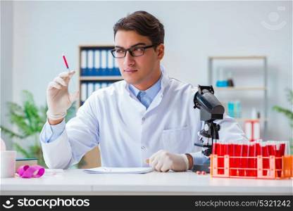 Doctor working with blood samples