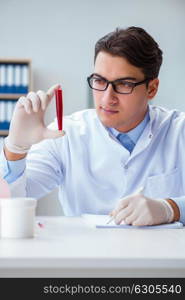 Doctor working with blood samples