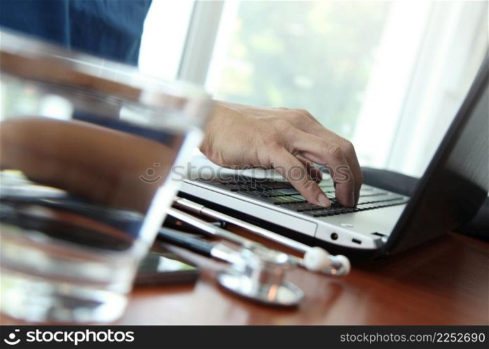 Doctor working with digital tablet and laptop computer in medical workspace office and medical network media diagram as concept
