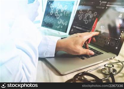 Doctor working with digital tablet and laptop computer with smart phone in medical workspace office and video conferance as concept  