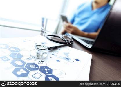 Doctor working with laptop computer in medical workspace office and medical network media diagram as concept