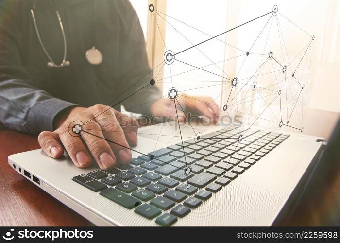 Doctor working with laptop computer in medical workspace office and overcast exposure effect with social media diagram