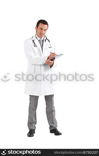 Doctor writing on clipboard smiling
