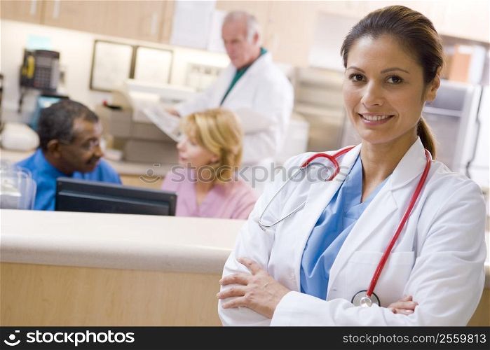 Doctors And Nurses At The Reception Area Of A Hospital
