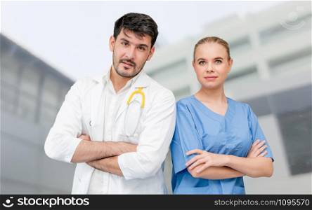 Doctors at hospital office working with another doctor. Healthcare and medical services.