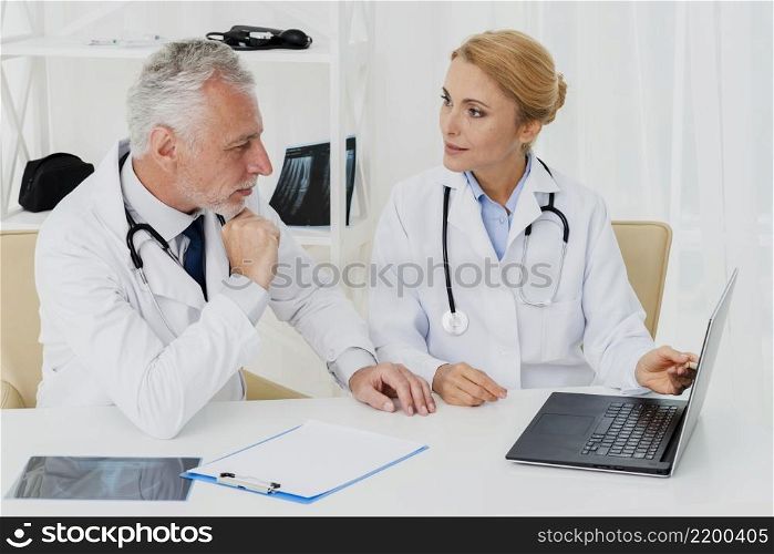 doctors doing research laptop