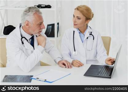 doctors doing research laptop