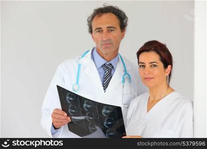 Doctors looking at an x-ray
