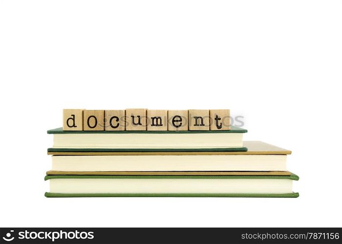 document word on wood stamps stack on books, knowledge and information concept