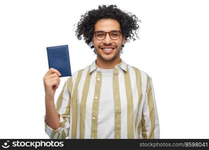 documents and people concept - smiling man with passport over white background. smiling man with passport