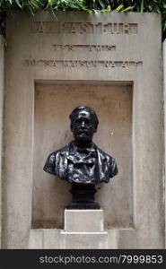 DOLE, FRANCE ? CIRCA JULY 2015 Bust of Luis Pasteur near his home