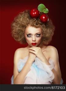 Doll woman with cherries. Artist makeup.