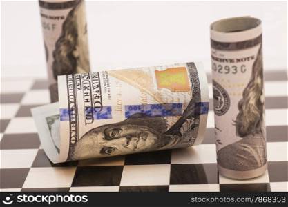 Dollar bills on a chess board