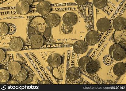 Dollar coins and notes - vintage. One cent coins and One Dollar banknotes currency of the United States useful as a background - vintage sepia look