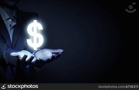 Dollar concept. Close up of businesswoman and dollar symbol in her palms