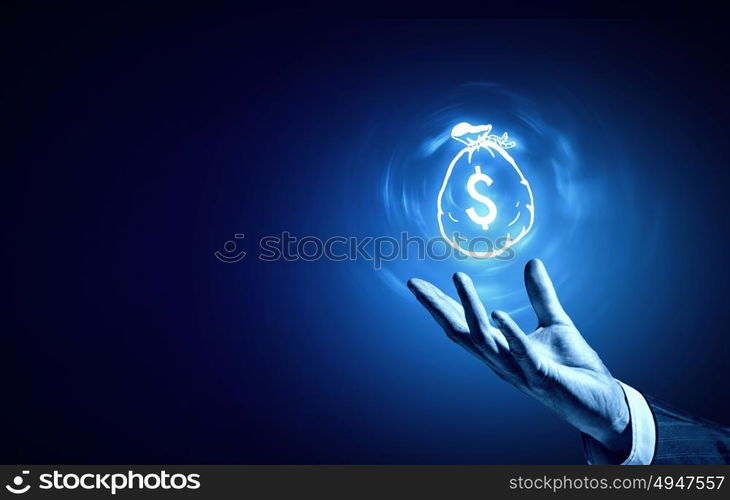 Dollar concept. Person hand holding money concept on blue background