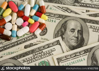 dollar currency notes and tablets. costs of health and medicine