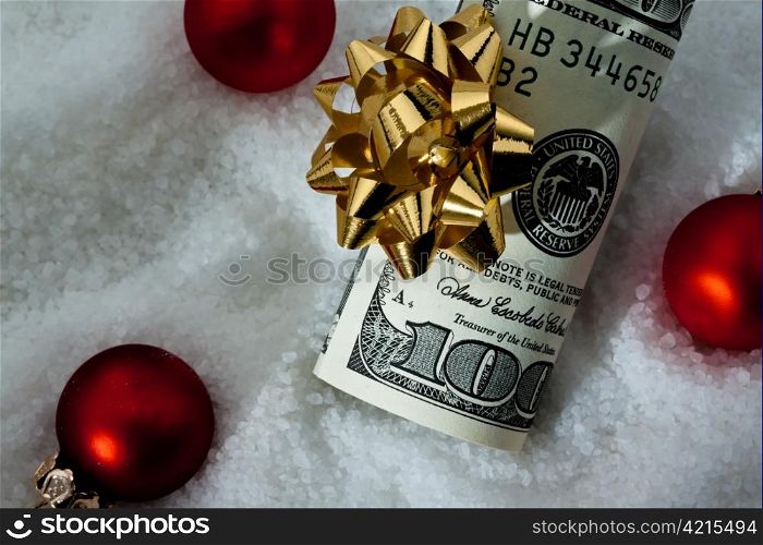 dollar currency notes for a gift. on a white background with gold ribbon