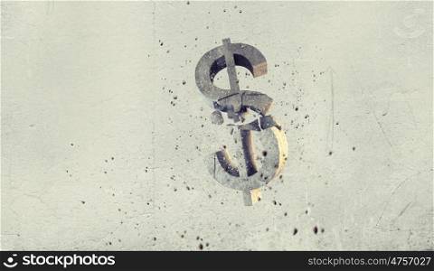 Dollar fall. Conceptual image with stone broken dollar sign