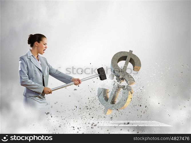 Dollar fall. Image of businesswoman breaking stone dollar symbol with hammer