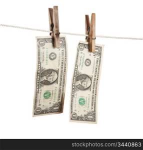 dollar is hanging on a wooden clothespin isolated on white background