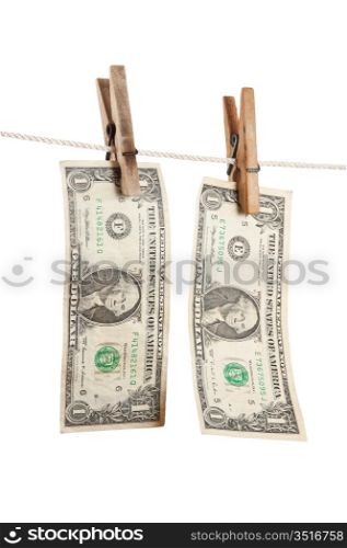 dollar is hanging on a wooden clothespin isolated on white background
