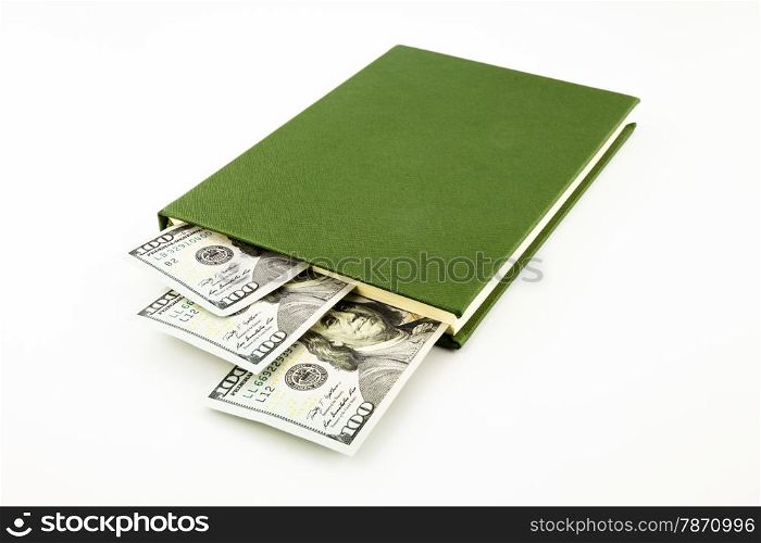dollar money banknotes and book, tuition fee, income and business concept