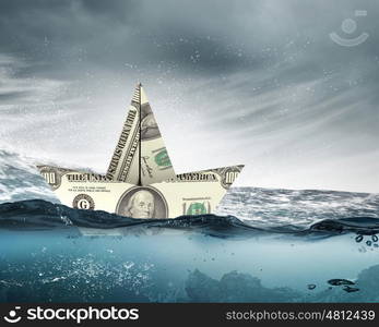 Dollar paper boat. Ship of dollar banknote floating on water