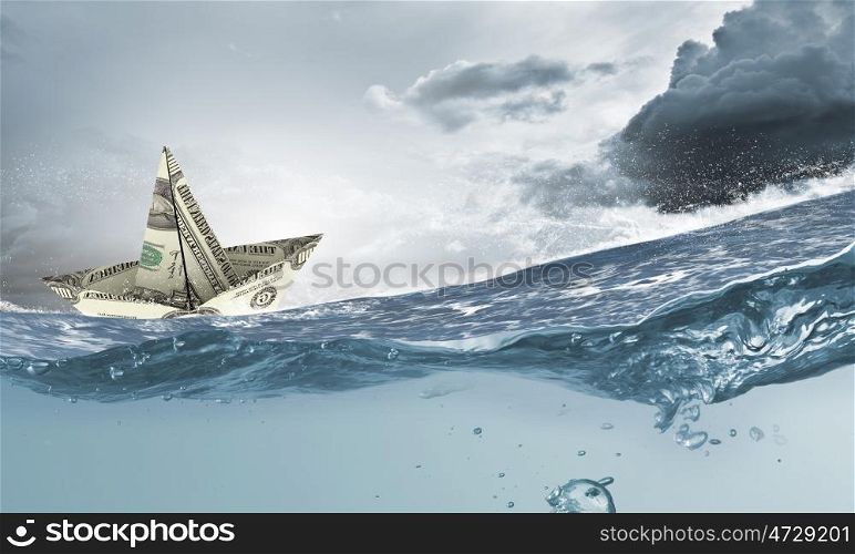 Dollar ship in water. Ship made of dollar banknote floating in water