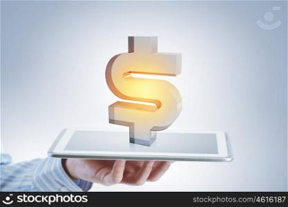 Dollar symbol on tablet screen. Businessman holding tablet with projected on screen dollar sign
