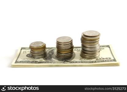 Dollars and coins isolated on white background