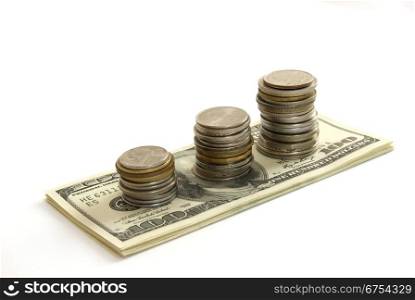Dollars and coins isolated on white background